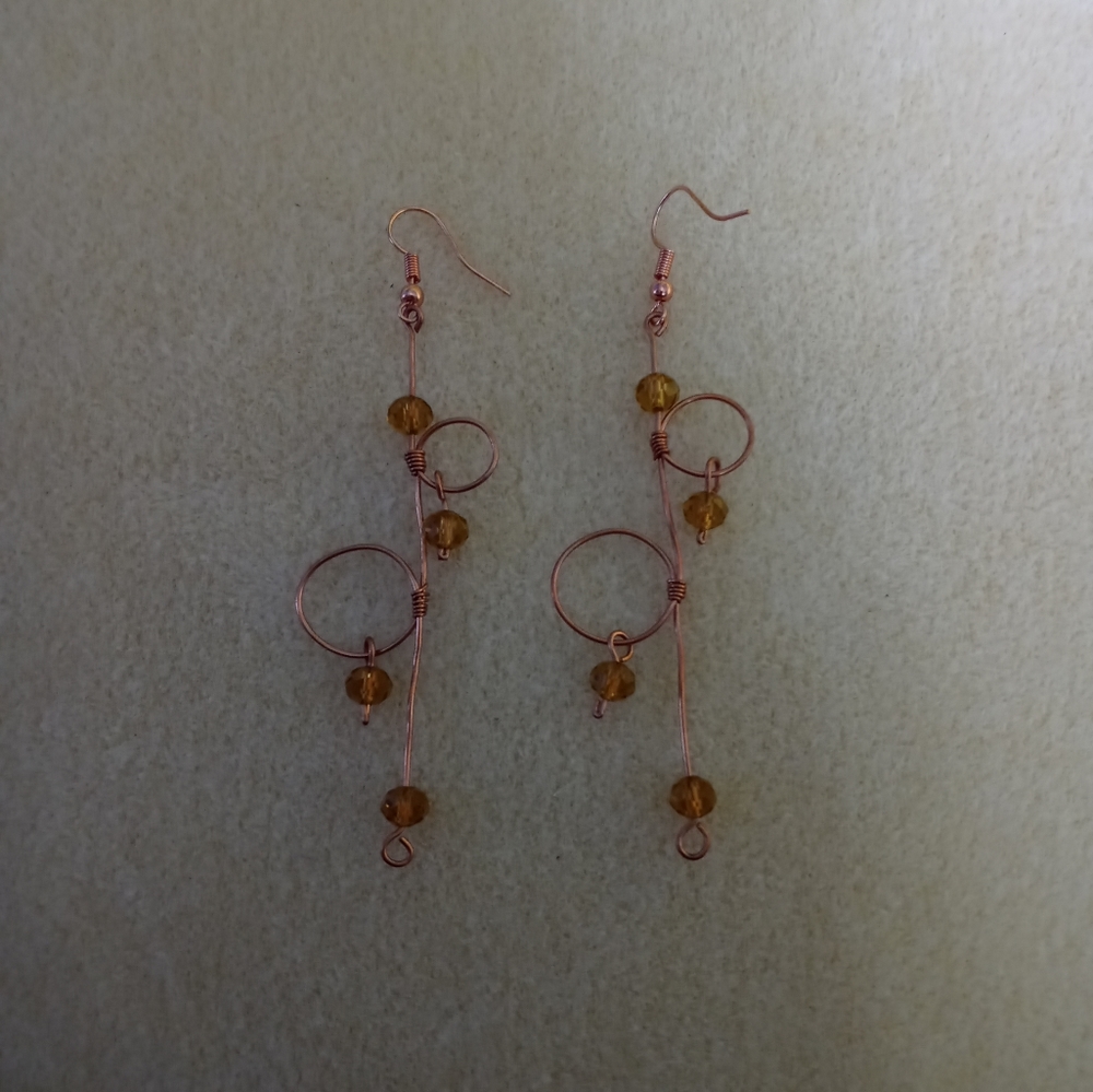 Copper and citrine colored glass Loop De Loop earrings